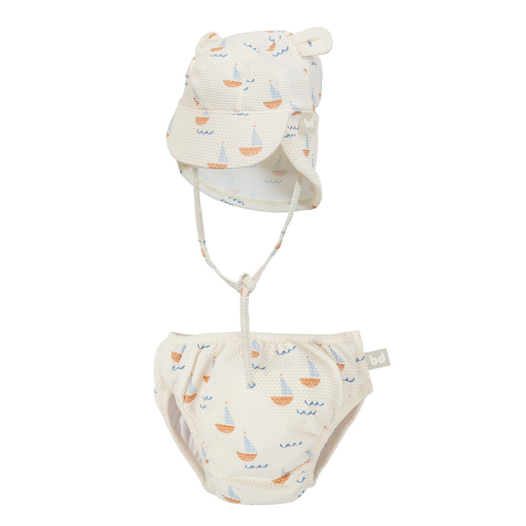 Set bañador pañal y gorrito con protección UPF 50+ Calypso · Bimbidreams