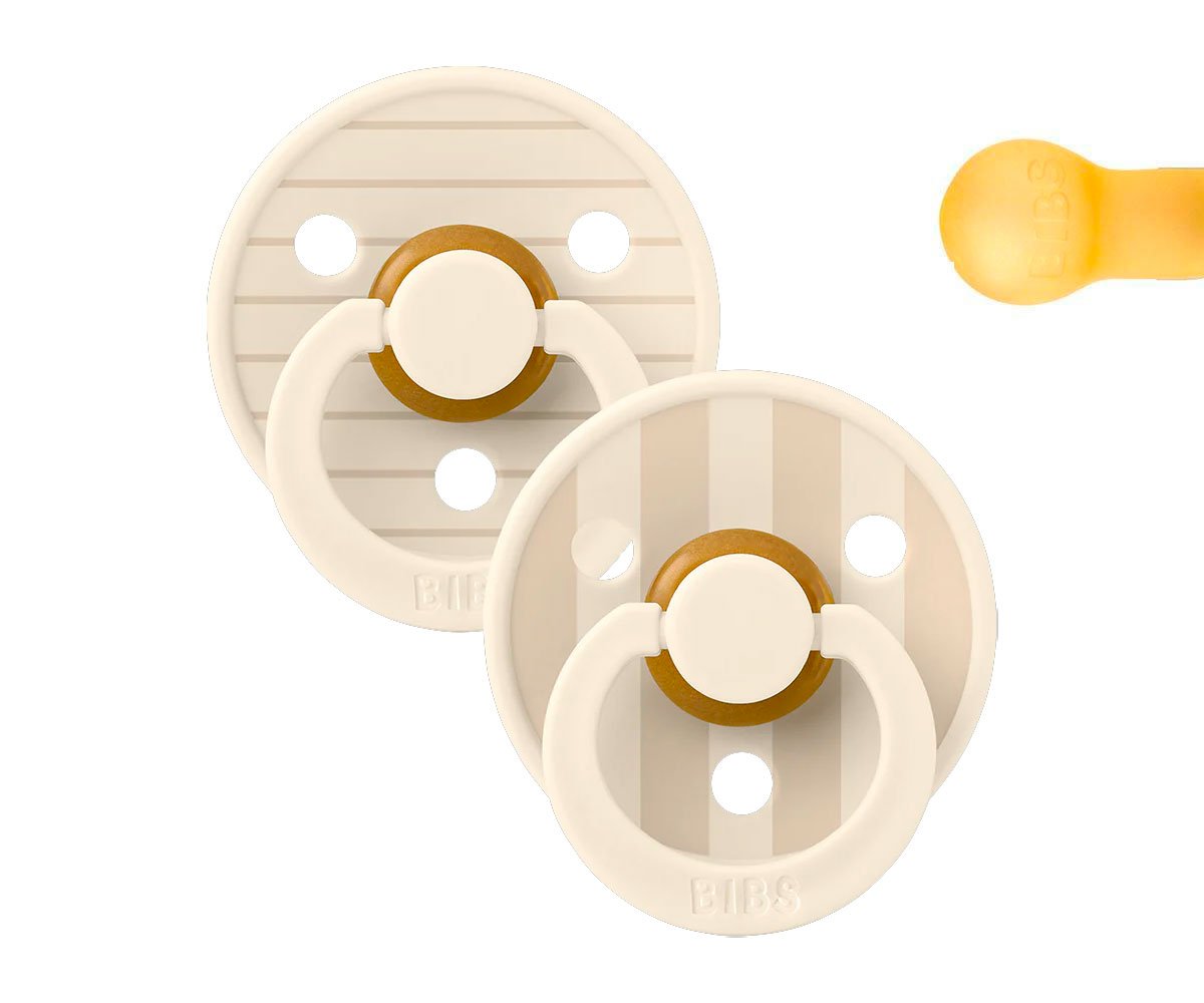 2 Chupetes Studio Colour Round Pin Ivory Vanilla Mix · Bibs