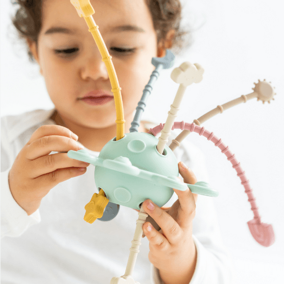 Juguete sensorial silicona Planet Fun · Saro